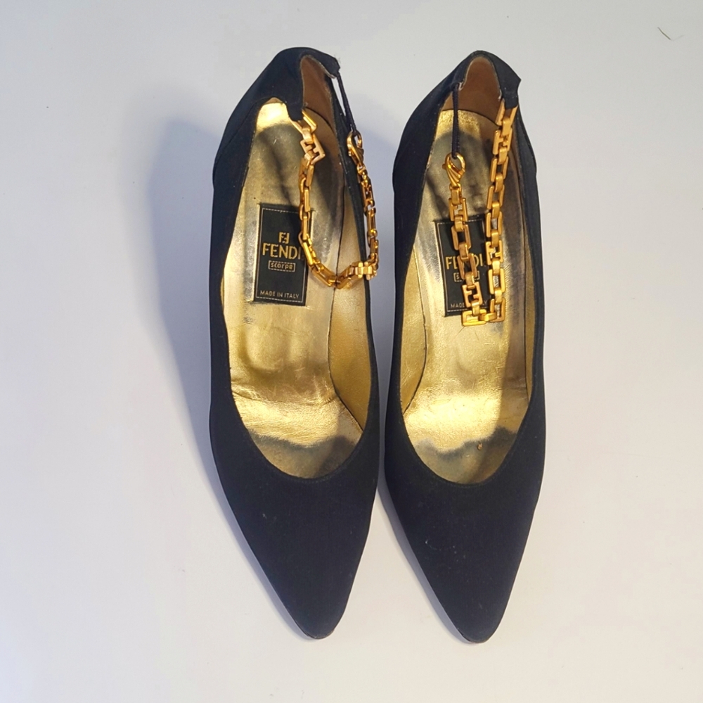 Fendi black vintage pumps with gold ff chain that clasp around the ankle.size 8M